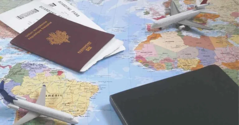 Image showcasing map of world and travel documents.