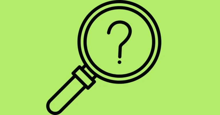 Image showcasing a question mark sign under a magnifying glass.
