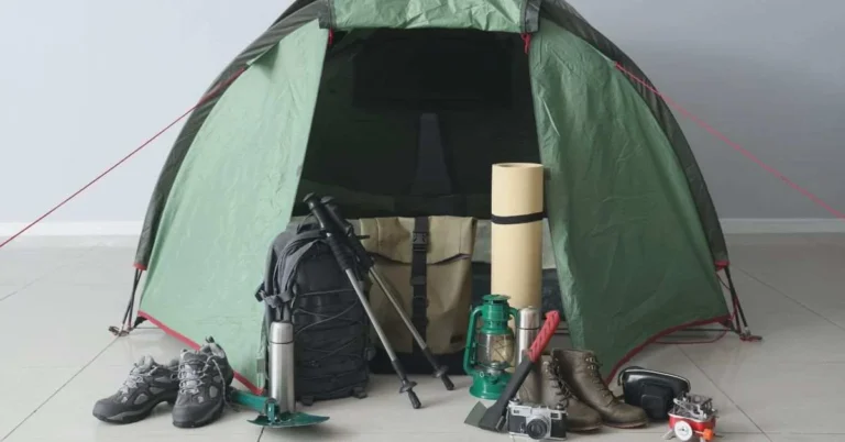 Image showcasing essential camping equipment including tent and joggers.