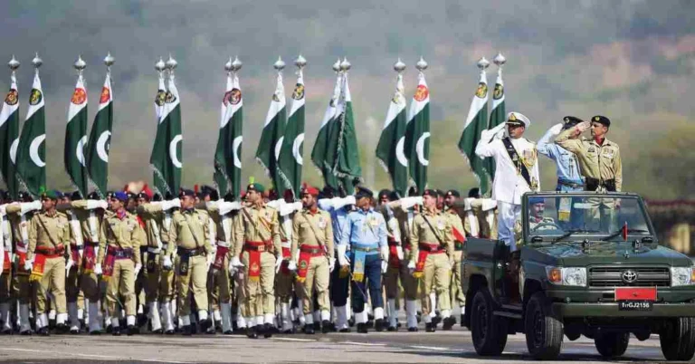Image showcasing march-past of troops during Pakistan Day Parade in Islamabad.